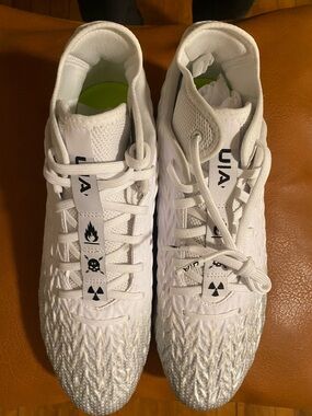Under Armour Clone white cleats.  Men's 10.5. Excellent new condition